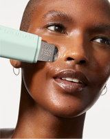 DERMAPORE+ SONIC SKINCARE SET - Sea Foam | model using DERMAPORE+ from the DERMAPORE+ Sonic Skincare Set in Sea Foam