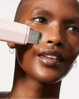 DERMAPORE+ AND SERUM SET - Blush | Image of model using DERMAPORE+ to extract pores on her nose