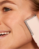 ULTIMATE SONIC SKINCARE SET - Blush | model using LUXE+ from the ULTIMATE SONIC SKINCARE SET in Blush