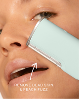 DERMAFLASH LUXE+ - Sea Foam | Model holding LUXE+ in Sea Foam near her face