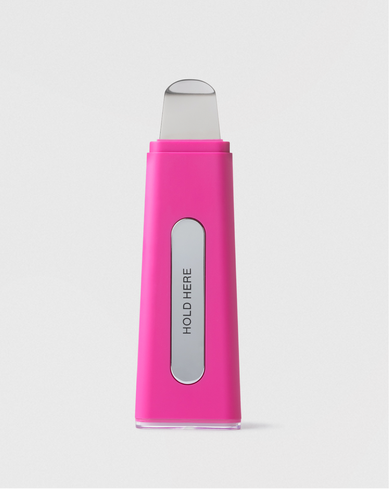 Pop | DERMPORE+ device in Pop Pink with silver “hold here” strip 