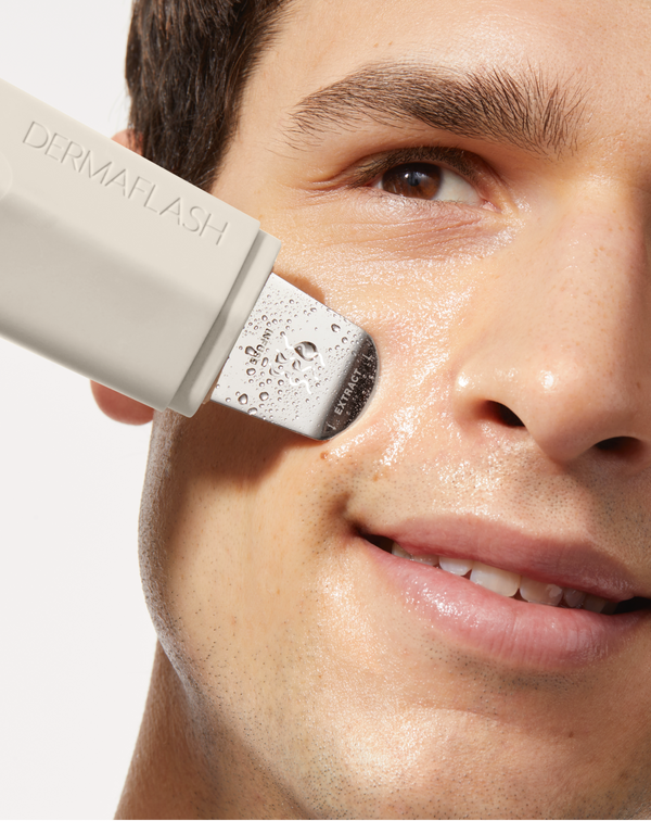 Model using the DERMAPORE+ device in Stone on his cheek 